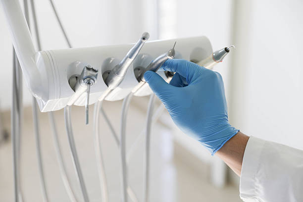 Professional Tooth Extraction technician working in Shawnee, KS